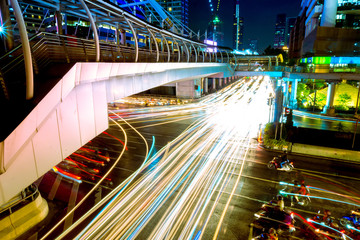 Fototapeta na wymiar The beautiful landscape of Bangkok at night, full of light and busy traffic. long exposure