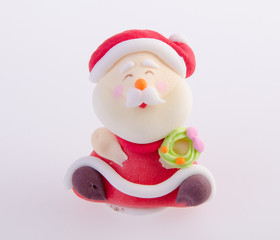 Santa Claus figurine on background