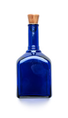 Blue glass bottle with a wooden lid on a clean white background..