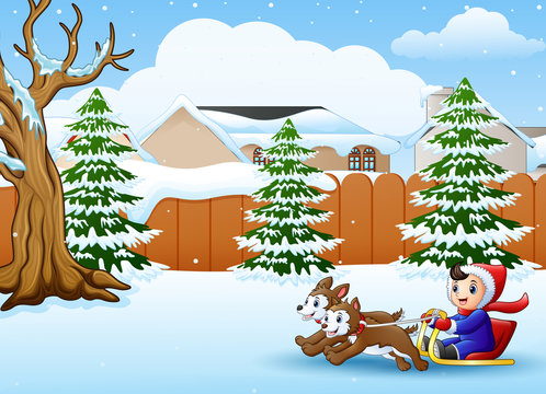 Cartoon boy riding sled on the snowing village pulled by two dogs