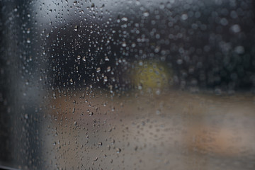 Drops of rain on glass