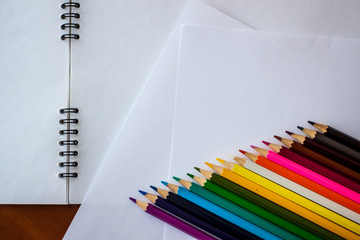Fototapeta premium Сolored pencils on a white background