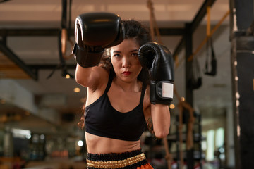 Fototapeta na wymiar Training in boxing gloves