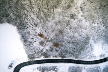 Aerial view of a mountain road in winter in Austria taken with a copter, drone