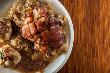 Pork knuckle with fried sauerkraut