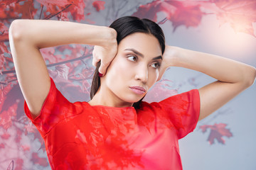 Rejection. Emotional expressive stubborn woman showing her feelings by closing the ears with two...