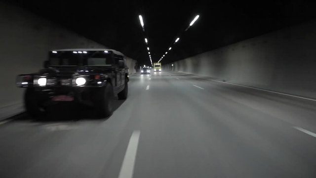 Cars Speeding in Tunnel