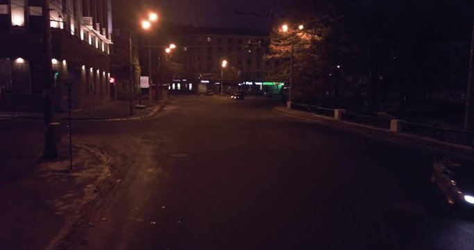 Night drift car in the city. Aerial front view