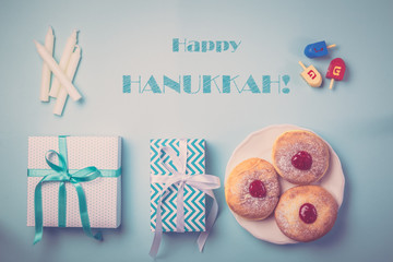 Symbols of hanukkah on blue background