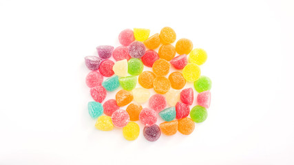 Colorful gummy candy on a white background.