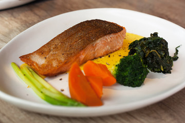 Salmon steak with side dish