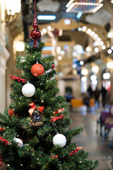 Photo of decorated Christmas tree with red and white balls