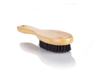 Wooden hairbrush on white background