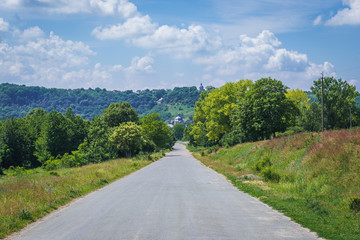 Fototapeta na wymiar Road in Ulashkivtsi village near Chortkiv city in Ukraine