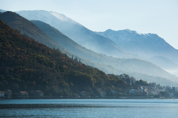 View of the city on the Adriatic sea coast in Montenegro. Misty landscape