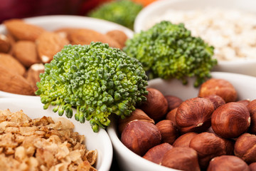 Fresh raw vegetables with nuts and cereals for cooking or eating. Vegetarian food.