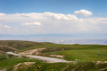 Fototapeta premium Road over scenic kyrgyz mountains