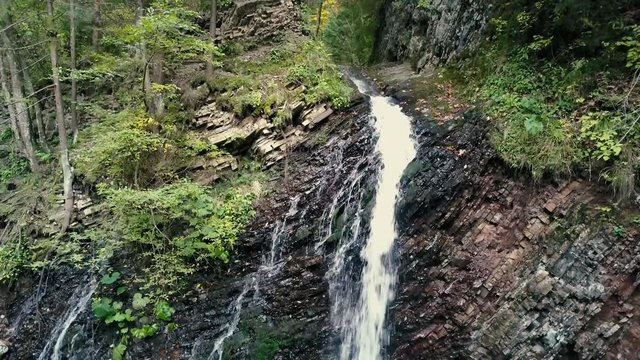 Aerial shoot of beautiful places in carpathian mountains. Waterfall Zhenetskyi Huk , Ukraine