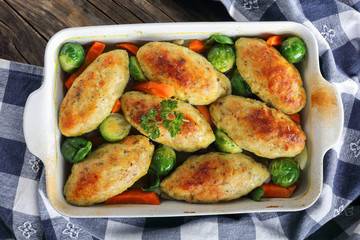 close-up of delicious roasted in oven fish cutlets