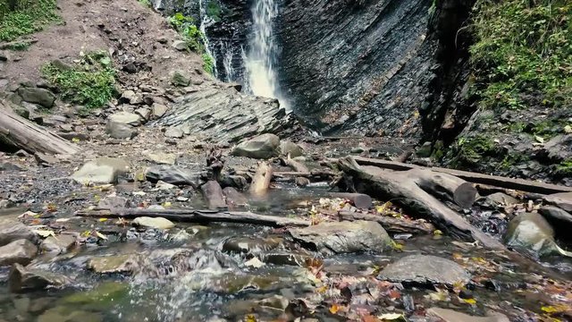 Beautiful autumn waterfall Zhenetskyi Huk in carpathian mountains, Ukraine. Aerial shoot from drone