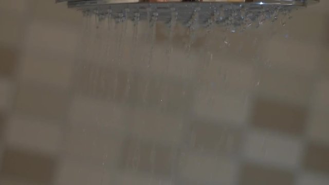 Close up shot of a shower, slow motion.