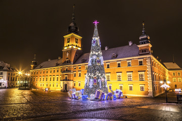 Fototapeta na wymiar Warsaw, Castle Square during the Christmas holidays at night, Poland
