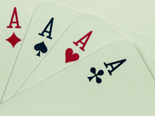 poker game cards isolated with green background