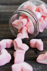 Heart of marshmallows in a glass jar