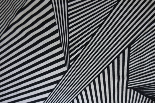 Texture of black and white lines on fabric from above