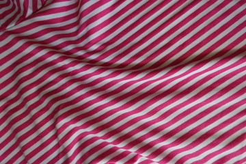 Draped striped fabric in pink and white