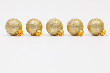 Gold Christmas decoration on the white desk