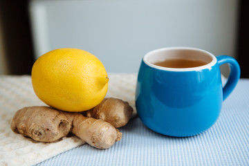 Cup of tea with ginger and lemon