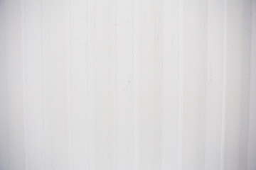 Corrugated white sheet for background.