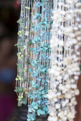 necklaces hanging in a shop