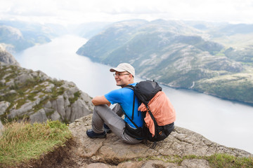 Man with Backpack at Lysefjord
