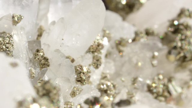Macro DOF glimmering opaque quartz with metallic pyrite creating a beautiful image