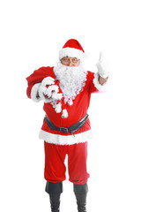 Real Santa Claus carrying big bag full of gifts, isolated on white background