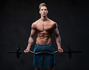 Athletic shirtless male biceps barbell workout. 