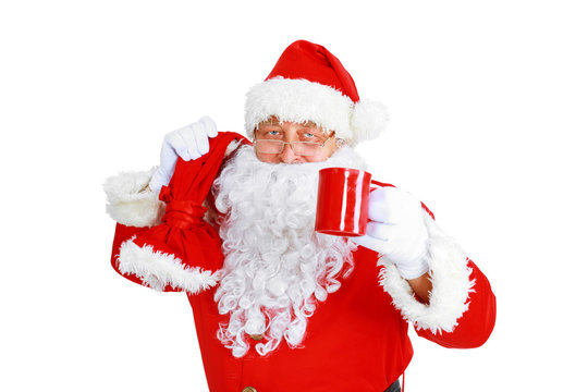 Santa Claus with coffee cup on white background