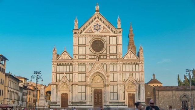 Tourists on Piazza di Santa Croce timelapse with Basilica di Santa Croce Basilica of the Holy Cross in Florence city.