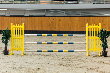 Show jumping barriers on the ground. Arena for equestrian sports
