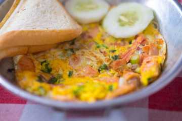 Pan-fried egg with pork and toppings