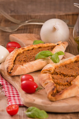 Turkish pide pizza with meat and onion. 