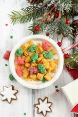 Xmas Breakfast Cereal with christmas colors red and green, overhead view