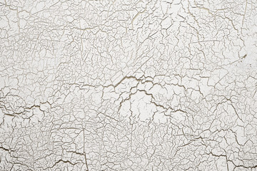 Background of white wall with cracked texture.