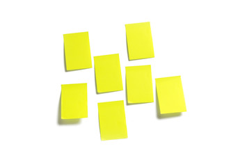 Blank yellow sticky notes on isolated white backgroud