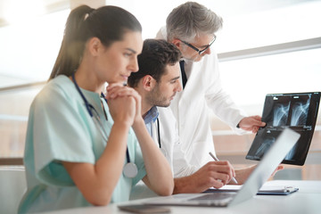 Medical team checking Xray results
