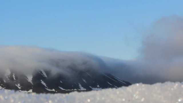 Layer of clouds drift down from table mountain
