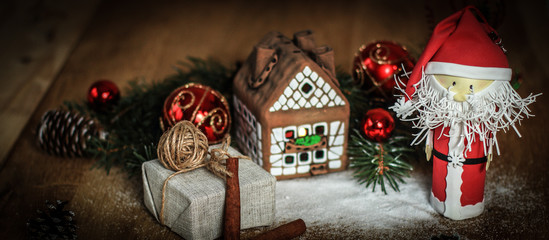 Christmas present on the background of a gingerbread house