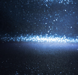 blue glitter lights christmas background. defocused